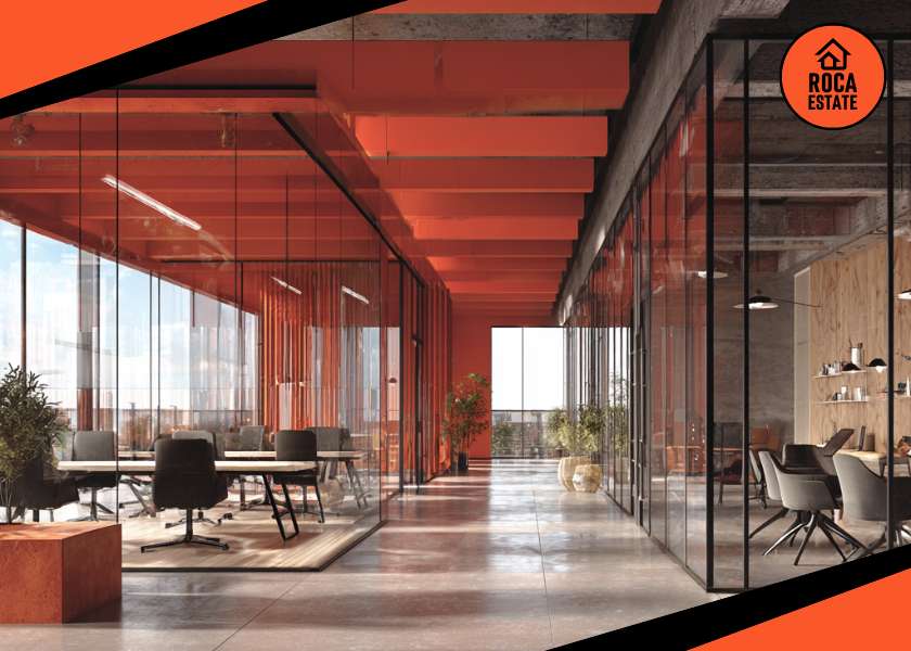 Premium commercial real estate office space under construction with open floor plans, large windows, and visible structural elements in progress.
