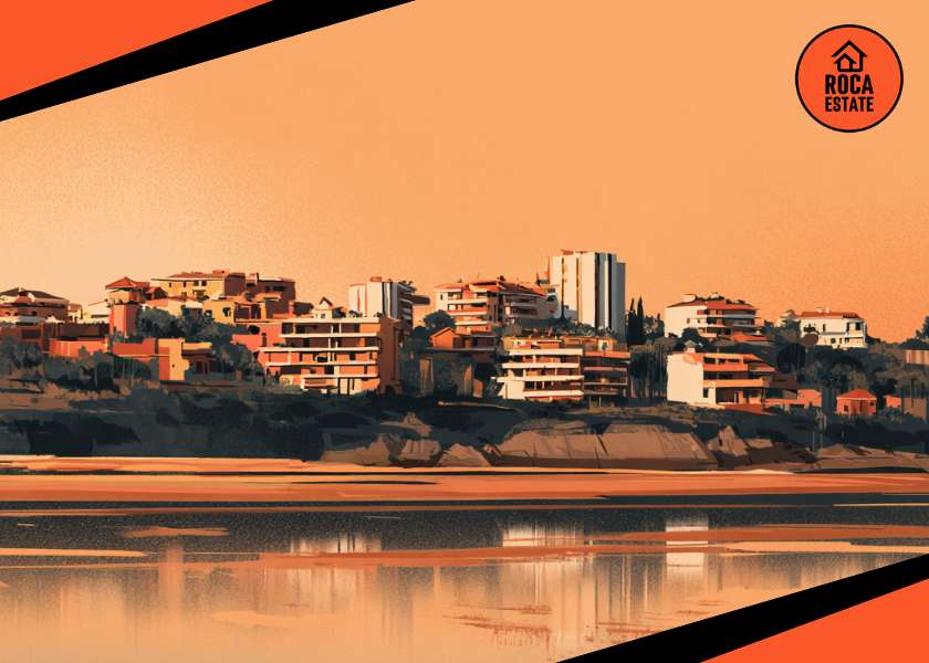 Coastal resort skyline in the Algarve during off-peak season, illustrating tourism-driven commercial real estate in Portugal with hotels and income-producing coastal assets.